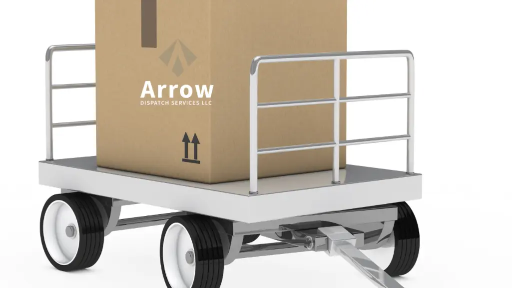 Large cardboard box with Arrow Dispatch Services LLC logo placed on a metal cart with wheels, symbolizing freight handling and logistics operations.
